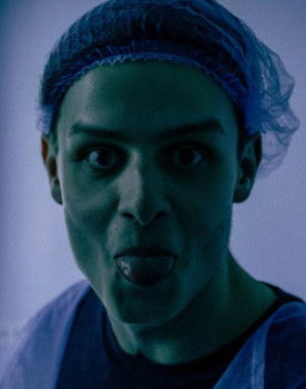 Zakhar Shestiaiev as Man in the bar