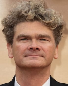 Simon Farnaby as Kris