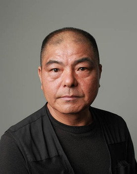 Seiroku Nakazawa as Barber shop owner