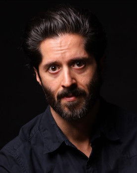 Darren Benjamin as Lou Romero