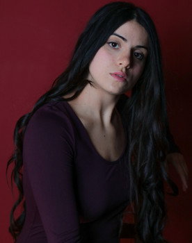 Penelope Molinari as Elly