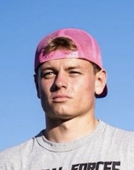 Shane Markowski as The Courier