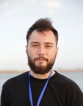 Dylan Robertson as Graduating Friend