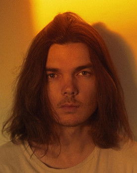 Dominic Simper as Guitar and Keyboards