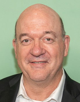 John Carroll Lynch as Carson