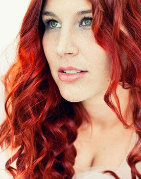 Charlotte Wessels as Lead Vocals