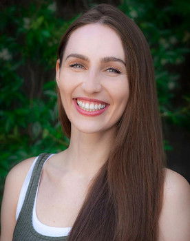 Dora Hart as Larissa