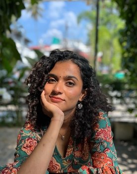 Revathi G as Simi George