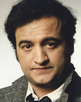 John Belushi as Slave Driver / Bartender