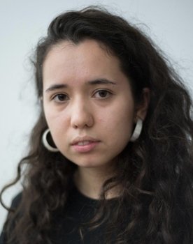Kit Zauhar as Riley