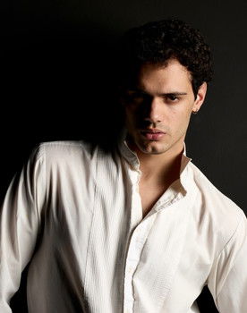 Hugo Coello as Adrien