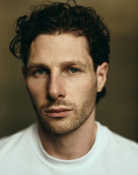 Alexander Howard as Handsome Man