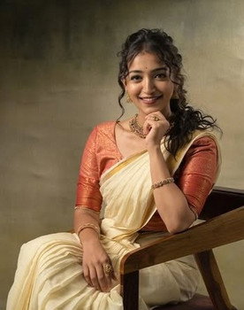 Priya Krishnan as Priya