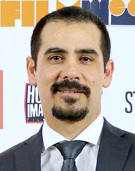 Tony Olmos as Office Worker