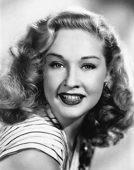 Bonita Granville as Mrs. Kirkley