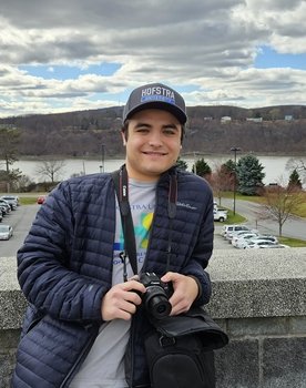 Jacob DiNobile as Voices (voice)