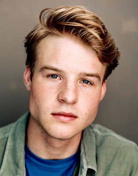 Aidan Micho as Peeta Mellark