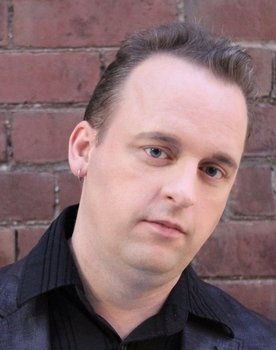 Kelly Michael Stewart as TV Interviewer