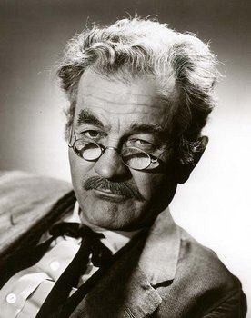 Milburn Stone as Lou Morgan