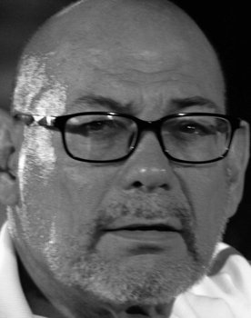 Jon Achaval as Travis