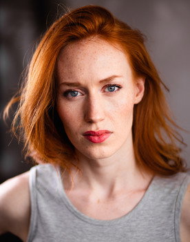 Kira Guloien as Vivian Kelly