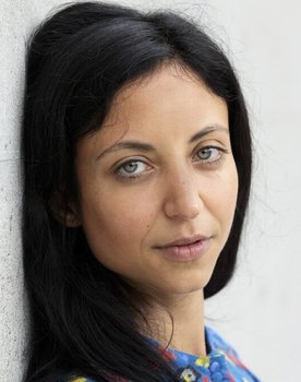 Julia Monte as Frida Veracruz
