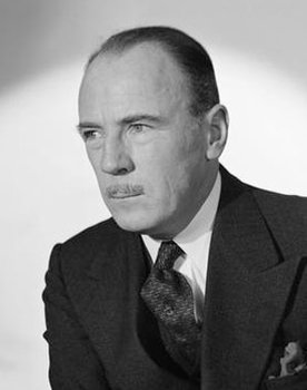 Roland Young as George