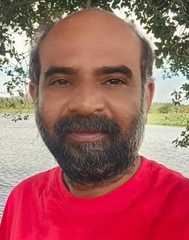 Pragatheeswaran as Raji`s Father