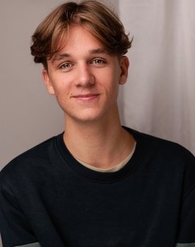 Barney Pike as Barista B/Monsieur Beh/Scoop B