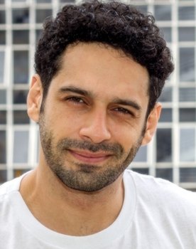 João Baldasserini as Carregador 1