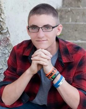 Kevin DeCoste as Ronnie (11 years)