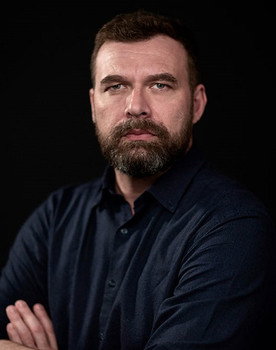 Fred Tatien as Padre de Roci