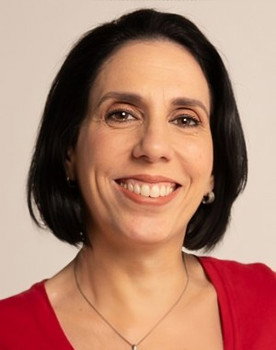 Juliana Guimarães as Booth attendant