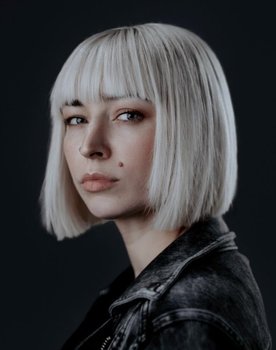 Joy Ford as Photographer Alex