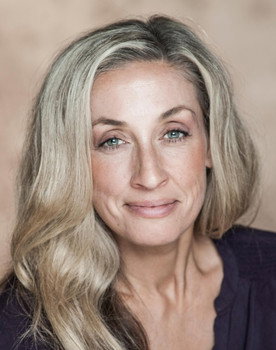 Farah Foster-Manning as Party Townsfolk (uncredited)