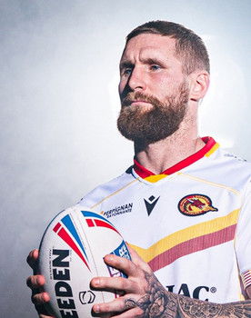 Sam Tomkins as 