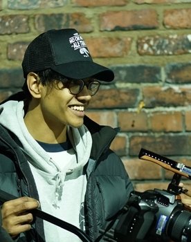 Eshaan Ghosh as Man in Street