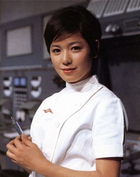 Yuriko Hishimi as Tomoko Tomoe