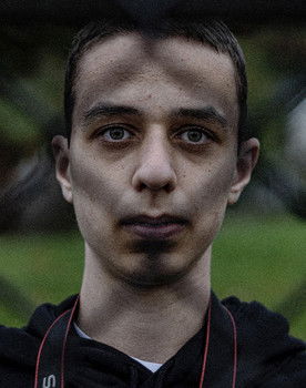 Dylan White as Podcast Host #1