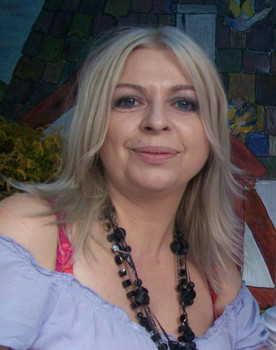 Violetta Arlak as Basia, sekretarka wójta