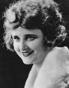 Bartine Burkett as His devoted wife