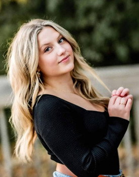 Mia Goodson as Brooks