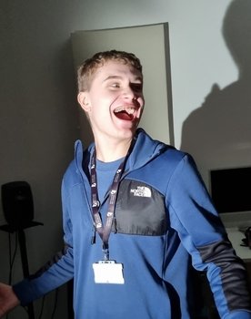 Matt Hodgkinson as Background Voice