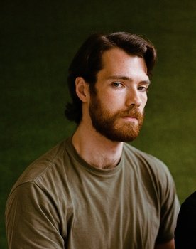 Ryan Cason as Aaron