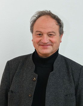 Rainer Maria Schießler as Priest