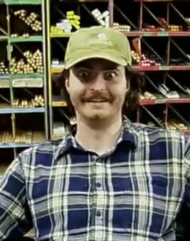 Ethan Scott as Employee