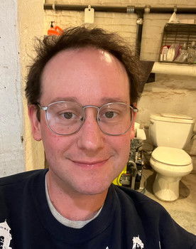 Ryan Bush as Susan Vuitton