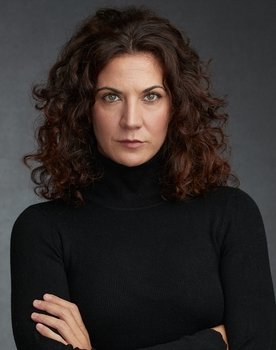 Ana Roche as 