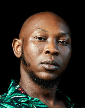 Seun Kuti as DJ Revolution