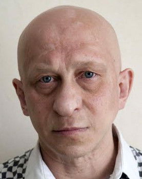 Yuriy Ashikhmin as Nina's attendant